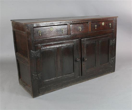 An early 18th century oak dresser base, W.4ft 10in. D.1ft 6in. H.3ft